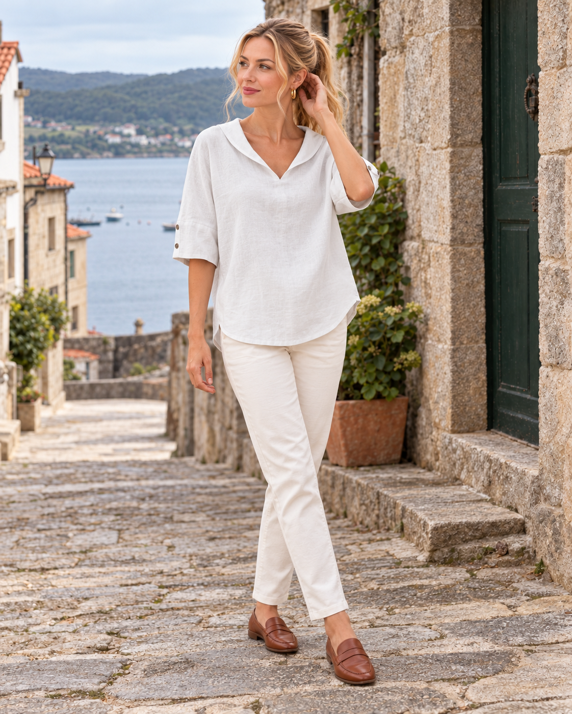 Julia en Blanco con Vera, cuerpo entero en un paisaje de Galicia.